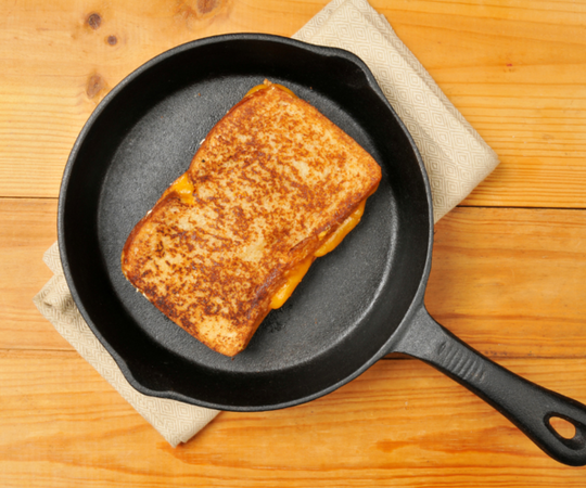 grilled cheese sandwich in a cast iron