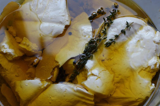 feta marinating in olive oil